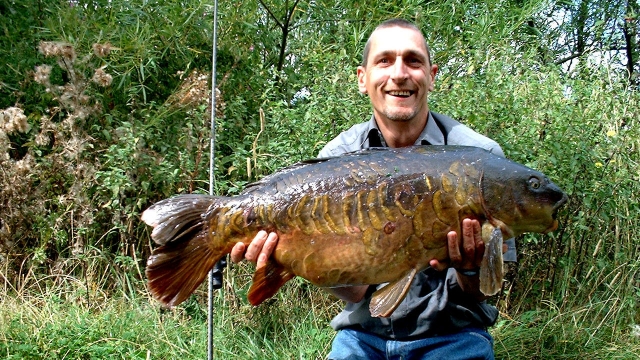 My second fish from lake 3, the mug at 28.4lb august 2003