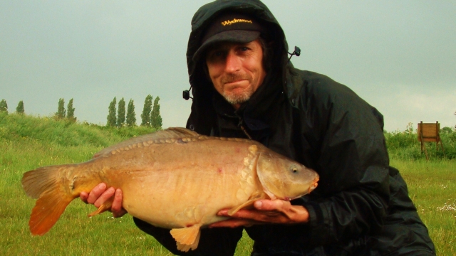 Another one of the mirrors which fell to my pre digested fishmeal/salmon oil mix this one was 17lb at the time and now much bigger!
