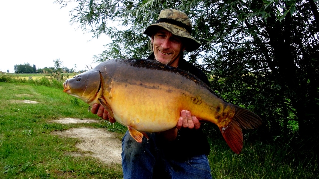 19.4lb mirror caught from the area where the pellet feeder was kept